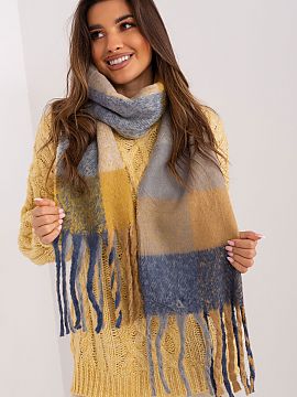 Šál AT  Tento dlhý farebný károvaný šál je dokonalým doplnkom vášho jesenného/zimného šatníka. Je vyrobený z odolného polyesteru a je