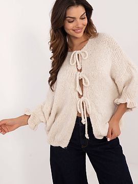 Sveter na rozopínanie Italy Moda  Dámsky ležérny sveter, ideálny na každodenné príležitosti. Má jednofarebný vzor, ktorý mu dodáva minimalistický, univerzálny c