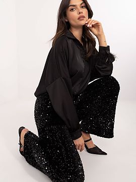 Dámske nohavice Italy Moda  Elegantné materiálové nohavice s flitrami, navrhnuté na výnimočné príležitosti, ako sú spoločenské výstupy a párty. Vyrobené 