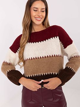 sweter Italy Moda  Štýlový dámsky sveter vo voľnom kroji je ideálnou voľbou na každý deň. Vyrobený z mäkkého zmesi materiálov ako akryl, polyamid