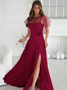 Dlhé šaty Bicotone  Elegantné šaty s tenkými ramienkami, vyrobené z ľahkého materiálu, doplnené lesklým flitrovým bolerom s ružou na páse. Lesklé d