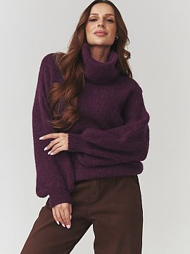 golf Makadamia  Štýlový dámsky golfový šat oversize je ideálnou voľbou na chladnejšie dni. Vyhotovený z mäkkej, príjemnej na dotyk pletenej lát