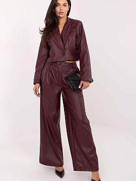 dámske nohavice Rue Paris  Moderné a štýlové dámske nohavice z ekokože, ktoré dokonale kombinujú trendy vzhľad s pohodlnosťou nosenia. Vyrobené z vysoko kva