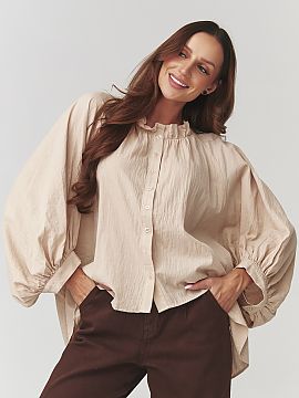 Dámske tričko Makadamia  Sázajte na štýl a pohodlie! Táto voľná dámska košeľa oversize je kombináciou ženskej jemnosti a moderného dizajnu. Dostupná v t