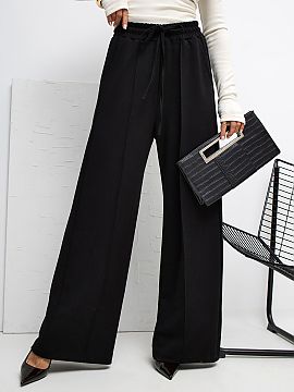 Tepláky Rue Paris  Mäkké nohavice typu palazzo vyrobené z mäkkého, elastického a príjemného materiálu, ktorý sa nádherne prilieha k postave a zabezp