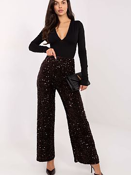 dámske nohavice Italy Moda  Elegantné materiálové nohavice s flitrami, navrhnuté na výnimočné príležitosti, ako sú spoločenské výjazdy a párty. Vyrobené 