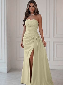 Dlhé šaty Bicotone  Ohromujúce večerné šaty v žltej farbe, vyrobené zo subtile lesklého materiálu so skrytým zipsom. Moderný korzet s efektnými záhy