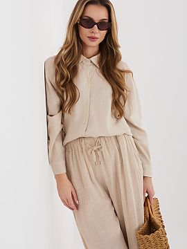 tričko s dlhým rukávom Italy Moda  Košeľa pre ženy v štýle casual, ktorá sa skvele hodí nielen do každodenných outfitov, ale aj do práce. Klasický, hladký vzor rob