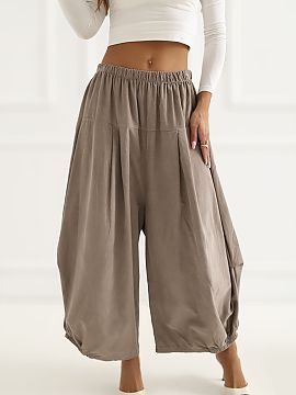 zamatové nohavice Italy Moda  Dámske štručkové nohavice vo voľnom štýle typu aladínky, ideálne na každý deň. Vyrobené z mäkkej a príjemnej bavlny, zaručuj