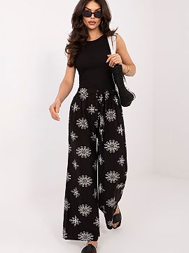 dámske nohavice Italy Moda  Dámske nohavice typu palazzo sú pohodlnou a štýlovou ponukou na každý deň, ideálnou pre ženy, ktoré oceniajú slobodu a módný vz