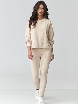 nastaviť Makadamia  Štýlový dámsky kompletný športový oblek je ideálnou kombináciou pohodlia a moderného dizajnu. Súprava pozostáva z voľnej mikiny