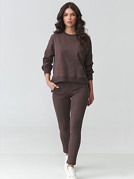 nastaviť Makadamia  Štýlový dámsky športový set je ideálnou kombináciou pohodlia a moderného dizajnu. Súprava pozostáva z voľnej mikiny s oversized 