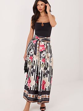 spódnica Factory Price  Dámska midi sukňa je elegantná a univerzálna ponuka, ktorá sa skvele hodí nielen do každodenných štýlov, ale aj do práce alebo na