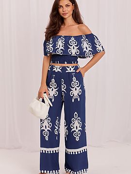 Sada Italy Moda  Štýlový dámsky set v boho štýle je ideálnou ponukou pre teplé dni pre ženy, ktoré oceniajú pohodlie a módný vzhľad. Súčasťo