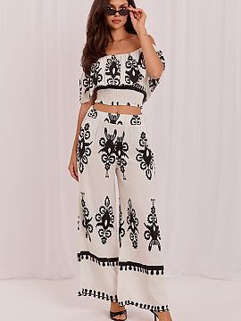Sada Italy Moda  Štýlový dámsky set v boho štýle je ideálnou ponukou pre teplé dni pre ženy, ktoré oceniajú pohodlie a módný vzhľad. Súčasťo