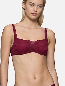 Bardotka / balconette Triumph  Podprsenka s kosticami typu balconette Body Make-Up Illusion Lace 10219845-00EW v módním pistáciovém odstínu je kombinací moderní ele