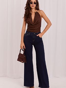 Džínsy Italy Moda  Dámske džínsy Wide Leg sú model, ktorý dokonale kombinuje klasický vzhľad s moderným strihom. Široké nohavice a vysoký pás zabez