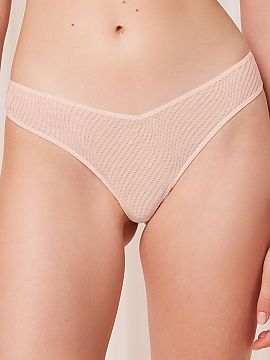 Brazílske nohavičky Triumph  Jasnoružové brazilské figovníky Harmony Spotlight High Leg 10217381 okouzlujú ženským strihom a elegantným dokončením. Model s vys