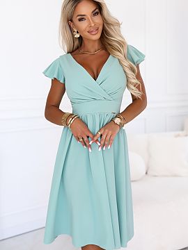 Sukňa na večer Numoco  Pistáciové šaty značky Numoco sú ľahkou, ženskou ponukou na okamihy, keď chcete vyzerať elegantne a cítiť sa voľne. Osvedčia sa