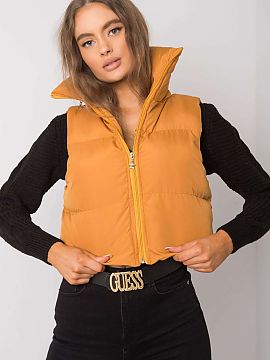 Vesta Ex Moda  Tmavožltá vesta so skrytou kapucňou. Vesta na zips.