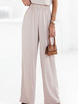 Dlhé nohavice IVON  Voľne padnúce nohavice ušité z elegantnej prémiovej tkaniny. Vysoký strih s pohodlným elastickým pásom, dve praktické vrecká a š